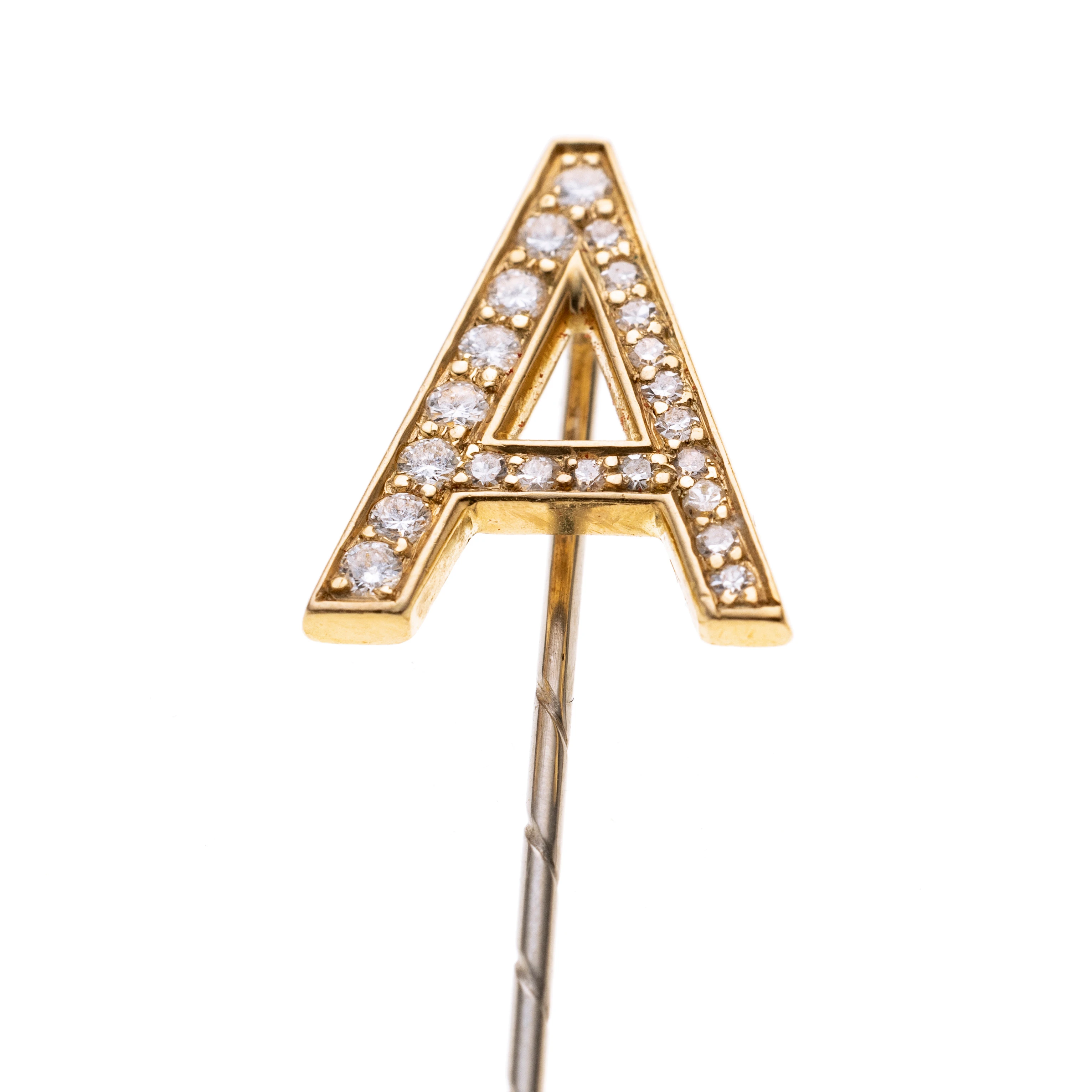 Ein Diamanten besetztes A. Nadel aus Weißgold.