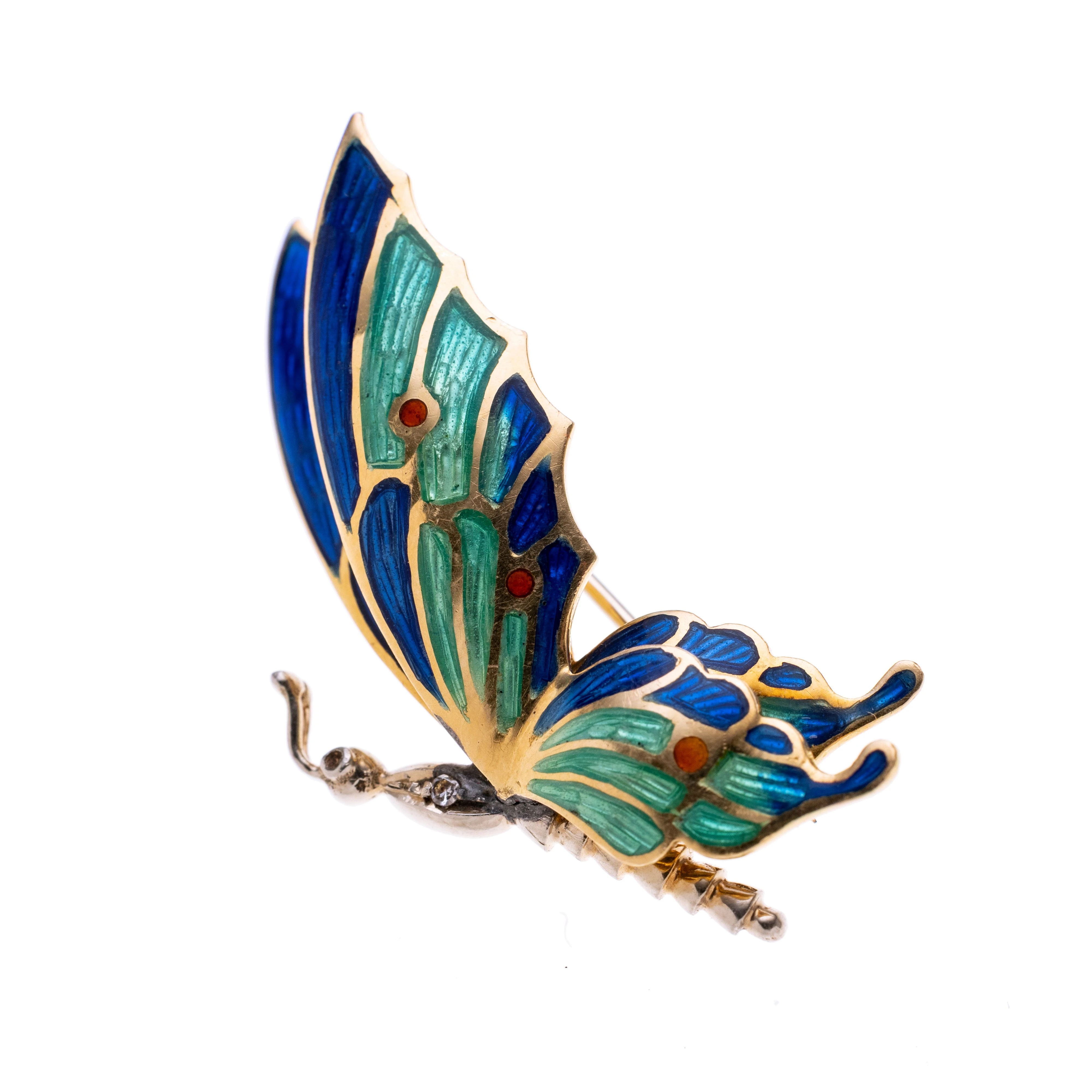 Ein Schmetterling, verziert mit Email und besetzt mit einem Diamanten ca. 0.01 ct.